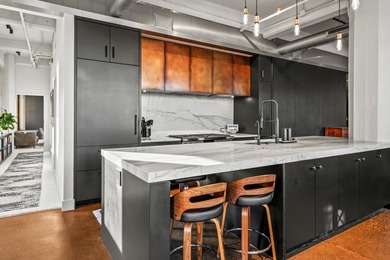 Statement residence in Milwaukee's Historic 3rd Ward! The foyer - photo 19