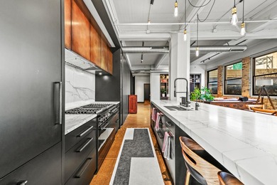Statement residence in Milwaukee's Historic 3rd Ward! The foyer - photo 21