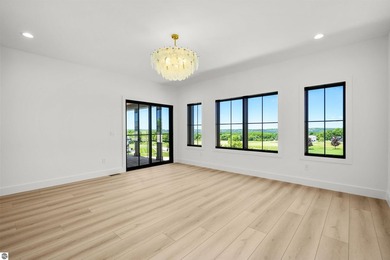 Commanding panoramic views of East Grand Traverse Bay from - photo 24