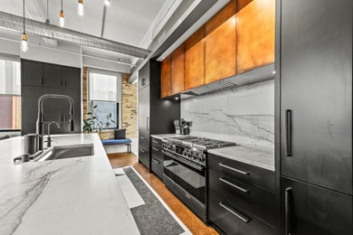Statement residence in Milwaukee's Historic 3rd Ward! The foyer - photo 25