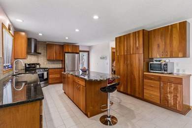 Perched on 4.58 private acres at the end of a cul-de-sac, this - photo 5