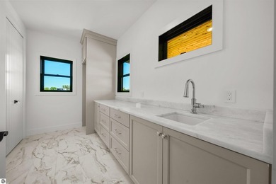 Commanding panoramic views of East Grand Traverse Bay from - photo 29