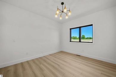 Commanding panoramic views of East Grand Traverse Bay from - photo 32