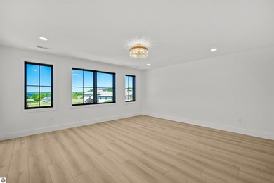 Commanding panoramic views of East Grand Traverse Bay from - photo 34
