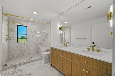 Commanding panoramic views of East Grand Traverse Bay from - photo 36