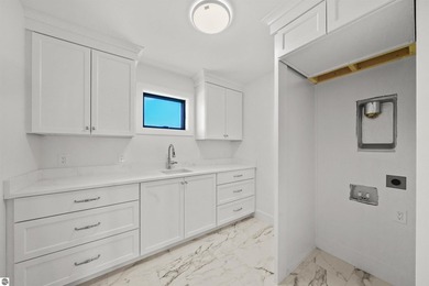 Commanding panoramic views of East Grand Traverse Bay from - photo 39