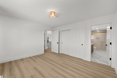 Commanding panoramic views of East Grand Traverse Bay from - photo 41