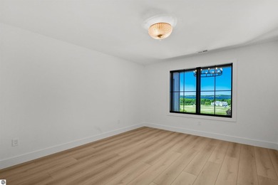 Commanding panoramic views of East Grand Traverse Bay from - photo 43