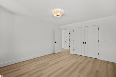 Commanding panoramic views of East Grand Traverse Bay from - photo 44