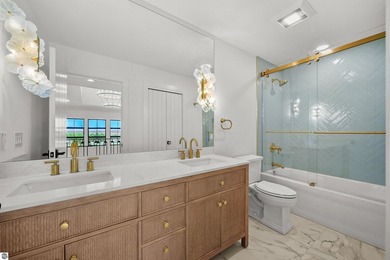 Commanding panoramic views of East Grand Traverse Bay from - photo 45
