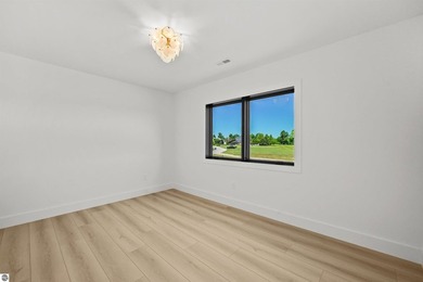 Commanding panoramic views of East Grand Traverse Bay from - photo 46