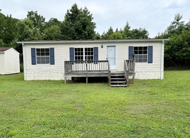Embrace the coastal lifestyle with this charming 3-bedroom - photo 3