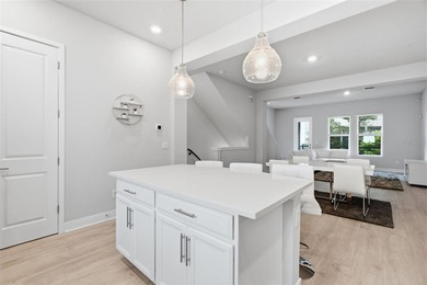 Modern 3-story townhome offering 3 bedrooms, 3.5 bathrooms, and - photo 12