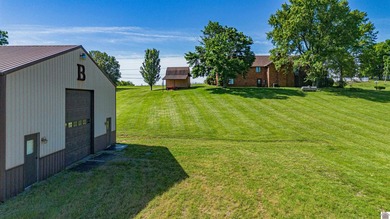 This stunning home and 40x80 shop with man cave, is beautifully - photo 13