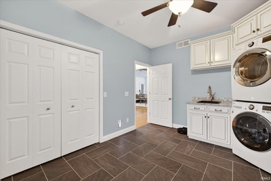Situated on a quiet cul-de-sac, this exceptional home is set on - photo 14