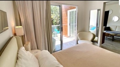 Discover a stunning 1-bedroom, 2-bathroom condo-hotel in the