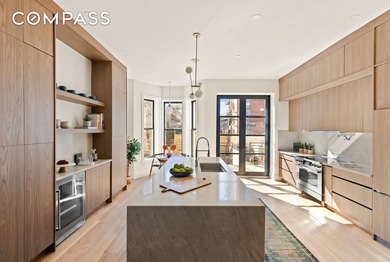 582 Quincy Street is a meticulously renovated 20-foot-wide - photo 1