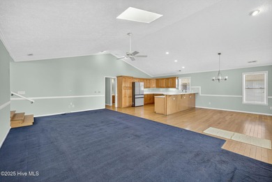 This exceptional single-story, open-concept home is a rare find