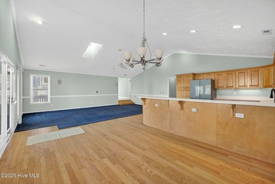 This exceptional single-story, open-concept home is a rare find