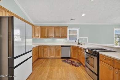 This exceptional single-story, open-concept home is a rare find