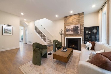This thoughtfully designed 3-bedroom, 2.5-bath home offers the - photo 4