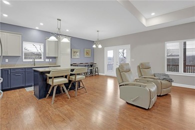 This expansive home in Warsaw, MO offers a blend of comfort and - photo 12