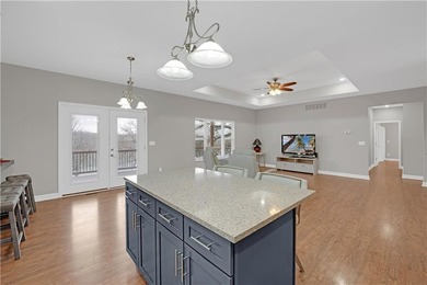 This expansive home in Warsaw, MO offers a blend of comfort and - photo 13