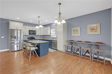 This expansive home in Warsaw, MO offers a blend of comfort and - photo 17