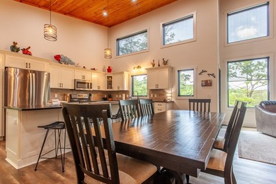 Secluded on Fontana Lake, this modern-mountain, custom-built - photo 20