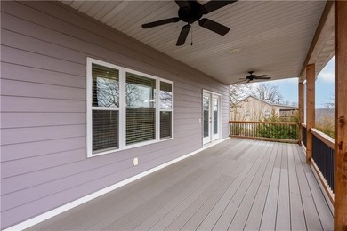 This expansive home in Warsaw, MO offers a blend of comfort and - photo 21