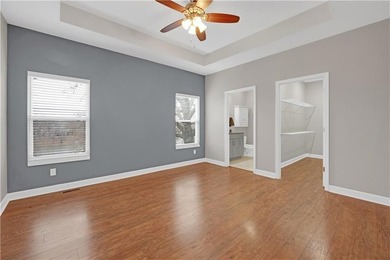 This expansive home in Warsaw, MO offers a blend of comfort and - photo 26
