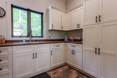 Secluded on Fontana Lake, this modern-mountain, custom-built - photo 27