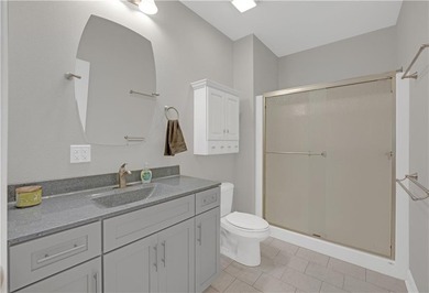 This expansive home in Warsaw, MO offers a blend of comfort and - photo 28