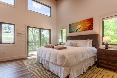 Secluded on Fontana Lake, this modern-mountain, custom-built - photo 29