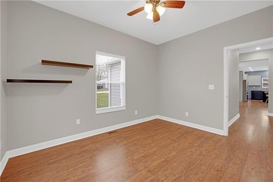 This expansive home in Warsaw, MO offers a blend of comfort and - photo 31