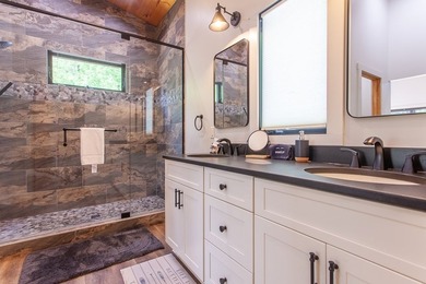 Secluded on Fontana Lake, this modern-mountain, custom-built - photo 32
