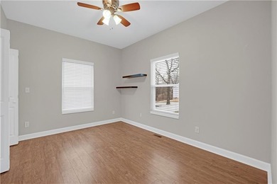 This expansive home in Warsaw, MO offers a blend of comfort and - photo 32