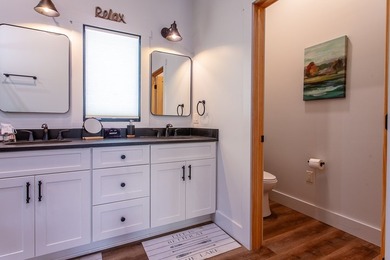 Secluded on Fontana Lake, this modern-mountain, custom-built - photo 33