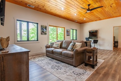 Secluded on Fontana Lake, this modern-mountain, custom-built - photo 37