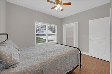 This expansive home in Warsaw, MO offers a blend of comfort and - photo 37