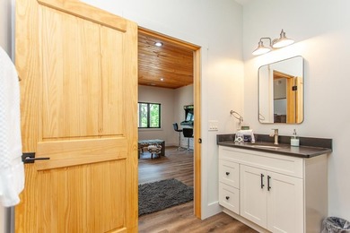 Secluded on Fontana Lake, this modern-mountain, custom-built - photo 38