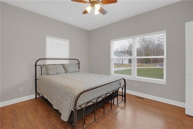 This expansive home in Warsaw, MO offers a blend of comfort and - photo 38
