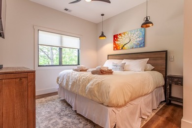 Secluded on Fontana Lake, this modern-mountain, custom-built - photo 40
