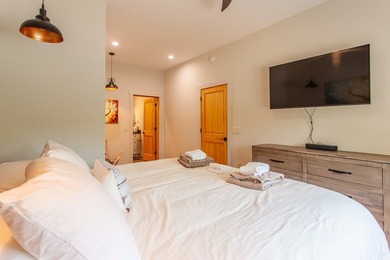 Secluded on Fontana Lake, this modern-mountain, custom-built - photo 41