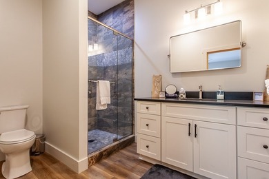 Secluded on Fontana Lake, this modern-mountain, custom-built - photo 43