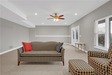 This expansive home in Warsaw, MO offers a blend of comfort and - photo 43