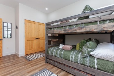 Secluded on Fontana Lake, this modern-mountain, custom-built - photo 46