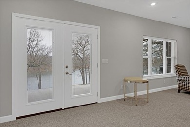 This expansive home in Warsaw, MO offers a blend of comfort and - photo 46
