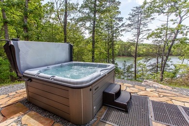 Secluded on Fontana Lake, this modern-mountain, custom-built - photo 47