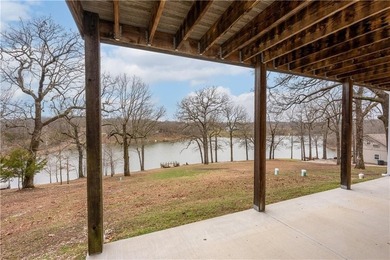This expansive home in Warsaw, MO offers a blend of comfort and - photo 47